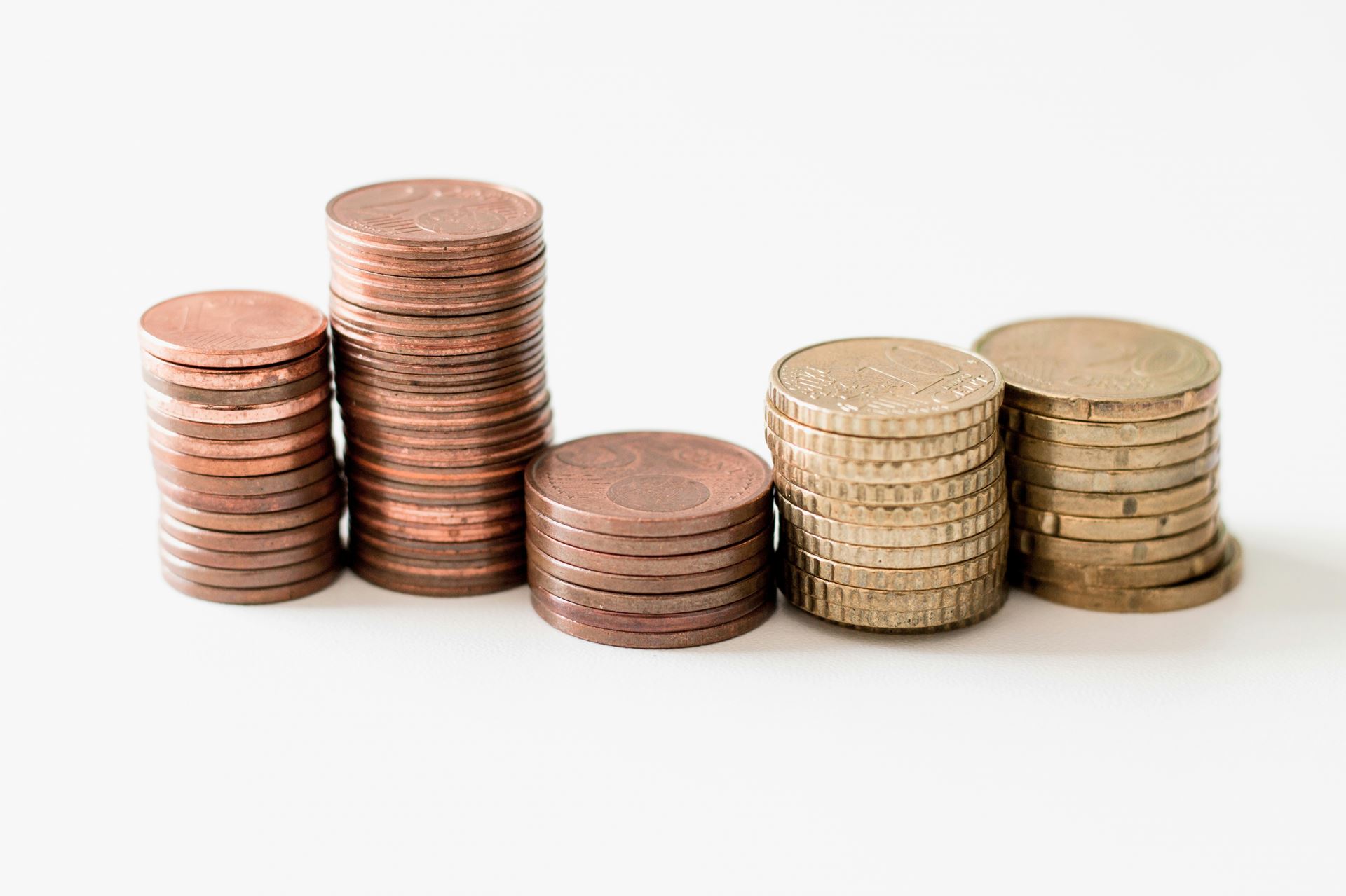 stacked copper and gold coins 